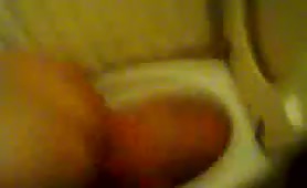 Bald guy smearing poop on his face