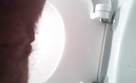 Shitting over the toilet