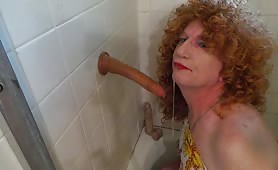Dirty shemale sucking a dildo