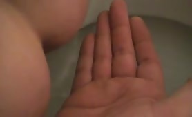 Pooping on his hands