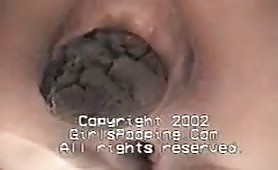 Long turd in close up