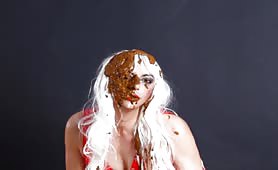 Blonde scat tranny smearing shit on her body