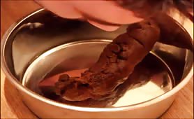 Twink eats poop from a bowl