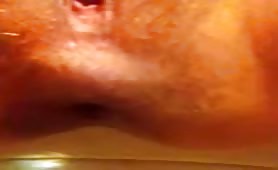 Wife shitting close up over the toilet