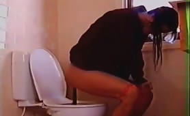 Brunette secretary pooping