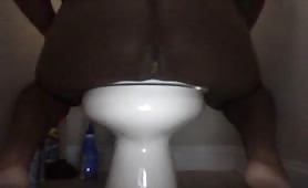 Shit over the toilet