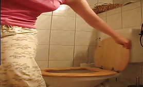 Shit over the toilet
