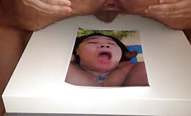 Man shits on photo of woman's face