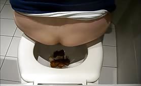 Chubby girl shitting hard on toilet, no wipe after