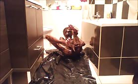 Old man covered in shit on bathroom floor