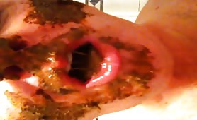 Mature man smears shit on face and eats it