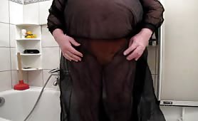 Peeing in his orange panties