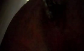 Man shitting on a plate, close-up on the turd