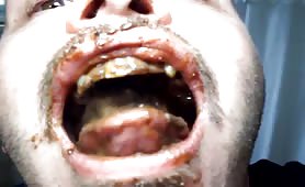 Bald guy swallowing big turd in close up