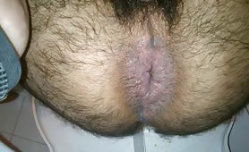Hairy guy shitting thick brown turd in toilet