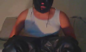 Masked man eating shit