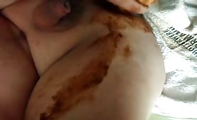 Fat guy dildoing his ass