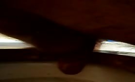 Gay guy squirting shit in the toilet