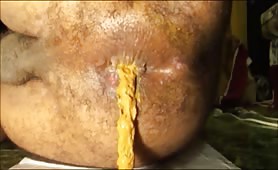 Man shitting on floor, mushy turd drops slow