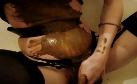 Smearing shit on belly