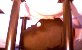 Man shitting on another man's back in bed