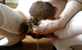 Man in white lace smearing brown shit on his ass