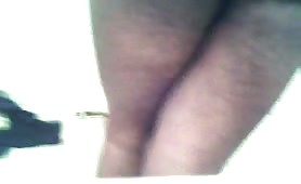 Lean guy shitting on his legs in weird pose