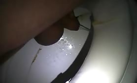 Creamy shit over the toilet
