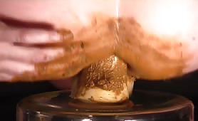 Dildo with a lot of shit in his ass