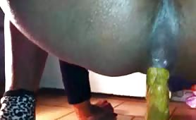 Ebony slut Caroline taking piss and poo on floor