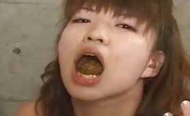 Asian eating in the bowl of shit