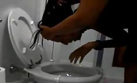 Drunk Latina puking in the toilet