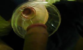 Man Peeing into the funnel