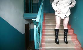 Cute girl peeing on the stairs