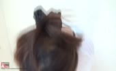 Hairy babe records herself while peeing