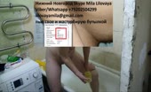 Woman pissing and masturbating with a bottle in bathroom