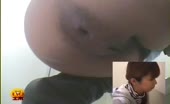 Woman shitting hard on camera with close-up view
