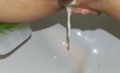 Creampied babe pushing big turd