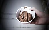 Blonde tattooed teen eating poop from a bowl