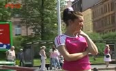 Woman shits on sidewalk then pisses on pole