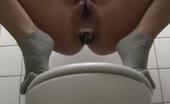 Shaved teen pooping