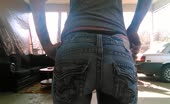 Tattooed teen shits in black thongs