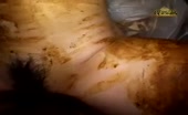 Rubbing shit on entire body in a hotel room