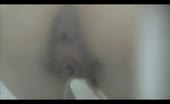 Close up of hairy babe shitting