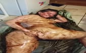 Dark haired babe smears poop on entire body