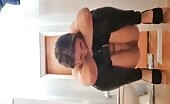 Beautiful chick in latex ripped pants pooping on the floor 