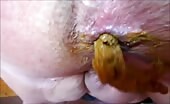 Yellow creamy poop in closeup