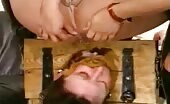 Sexy slave taking huge shitty load in BDSM