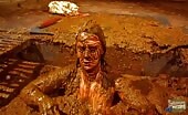 Kinky Betty taking bath in warm cowshit 