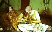 Cowshit covered couple masturbates in dirty room 